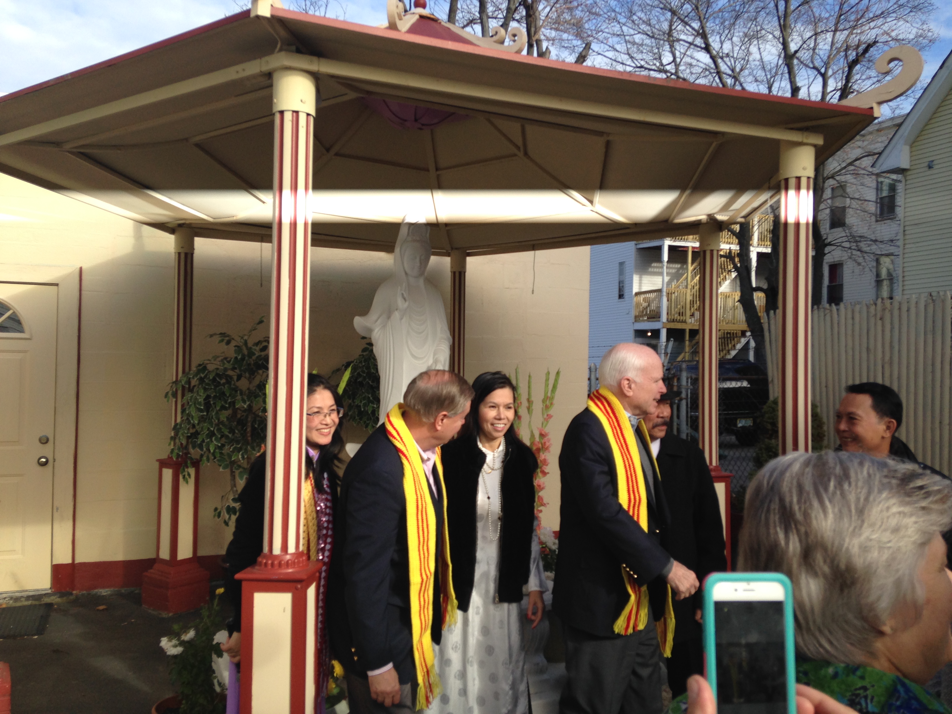 Chau Kelley and Candy Phan with Sens. Lindsey Graham and John McCain at a Vietnamese temple in New Hampshire on Saturday Nov 21
